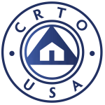 Circular logo with "CRTO USA" around the border. Inside, a house silhouette is centered within a triangle, all enclosed by a double ring. The design is in shades of blue.