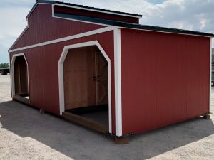 A red Westerner - 2908 shed with its door open.